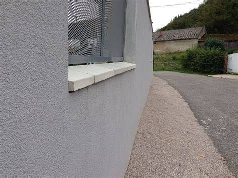 Betónové striešky na plote