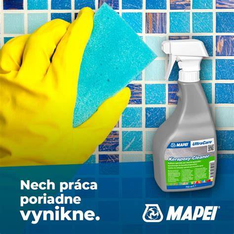 Aplikácia škárovacej malty gumovou stierkou