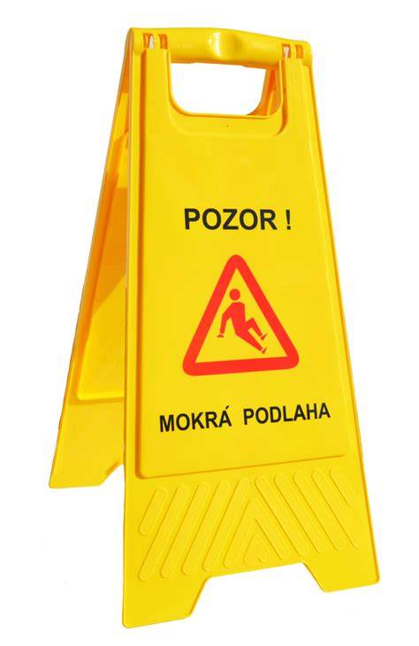 Žltá výstražná tabuľa s nápisom 