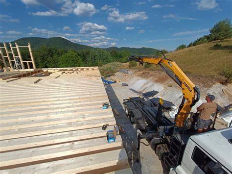 Doručenie stavebných materiálov hydraulickou rukou
