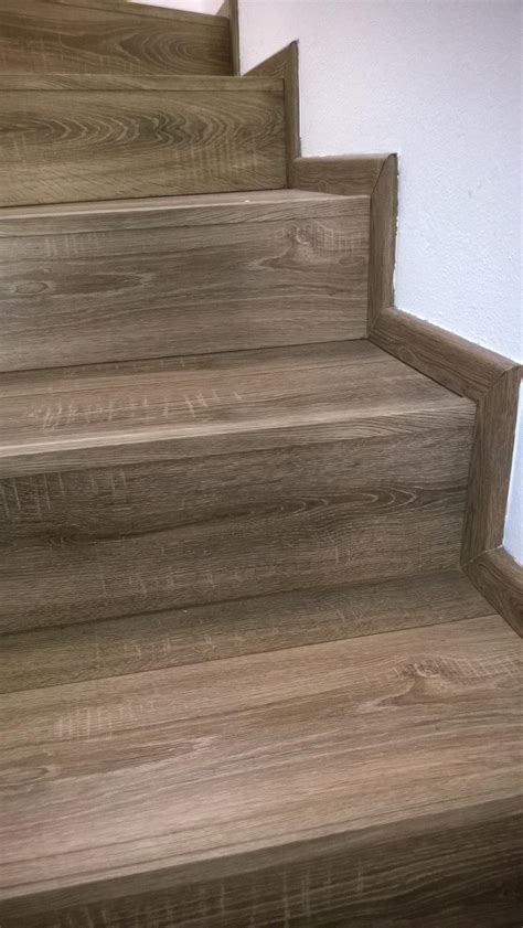 Rodinné schodisko obložené podlahou Quick-Step